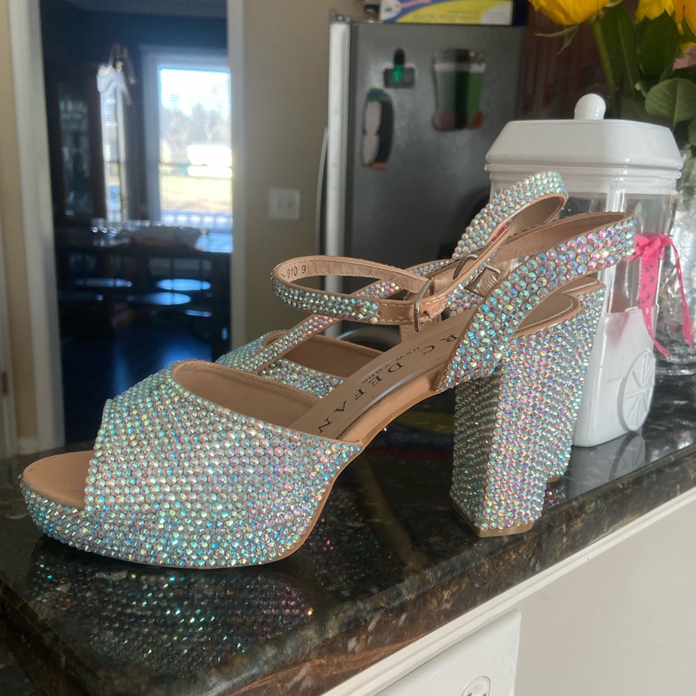 Size 9 Marc Defang Heels ( holographic/silver) worn once for opening number!!